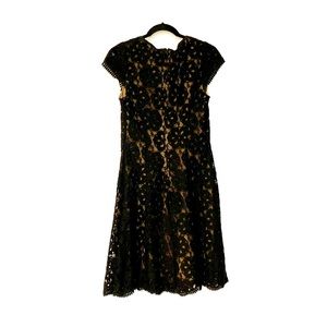 Lace dress with scalloped hems, sleeve edges and neckline